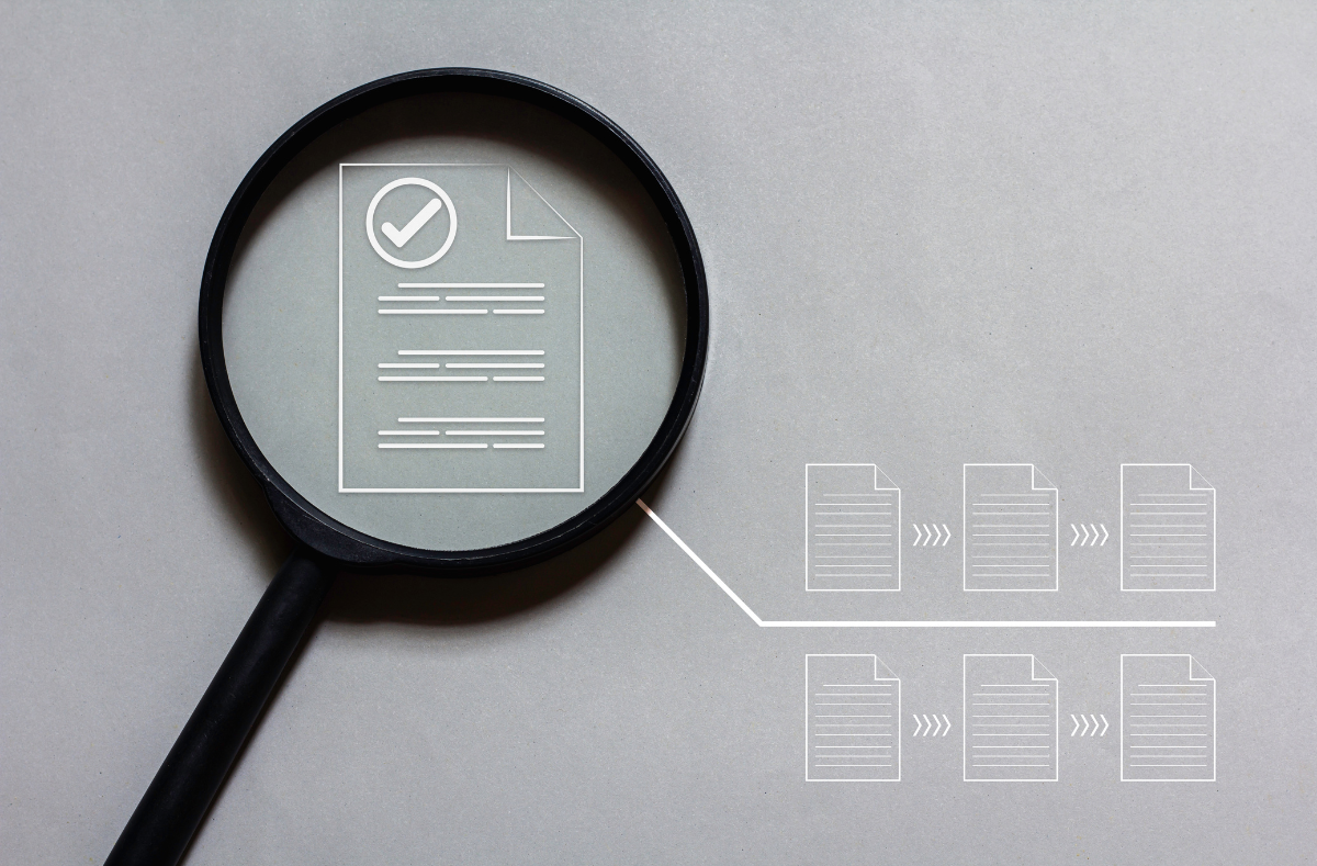Magnifying glass over a flow of documents, representing the need for leaders to see beyond reports and understand how work is moving across the organization.